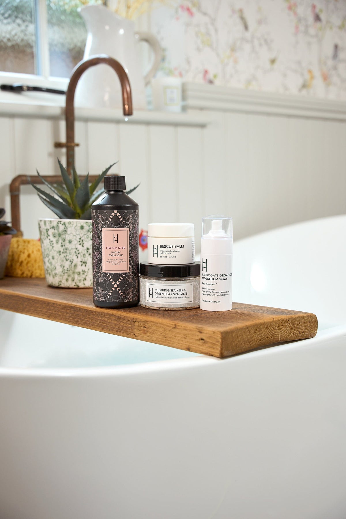 Harrogate Organics products laid out on a bath tray