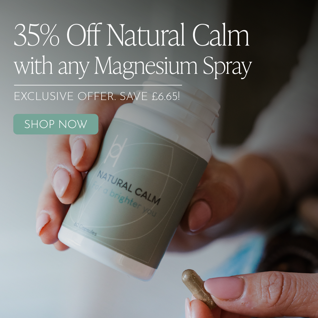 A person holds a bottle labeled Natural Calm while taking a capsule. Text above offers 35% Off Natural Calm with any Magnesium Spray and highlights an exclusive offer to save £6.65 with a Shop Now button.