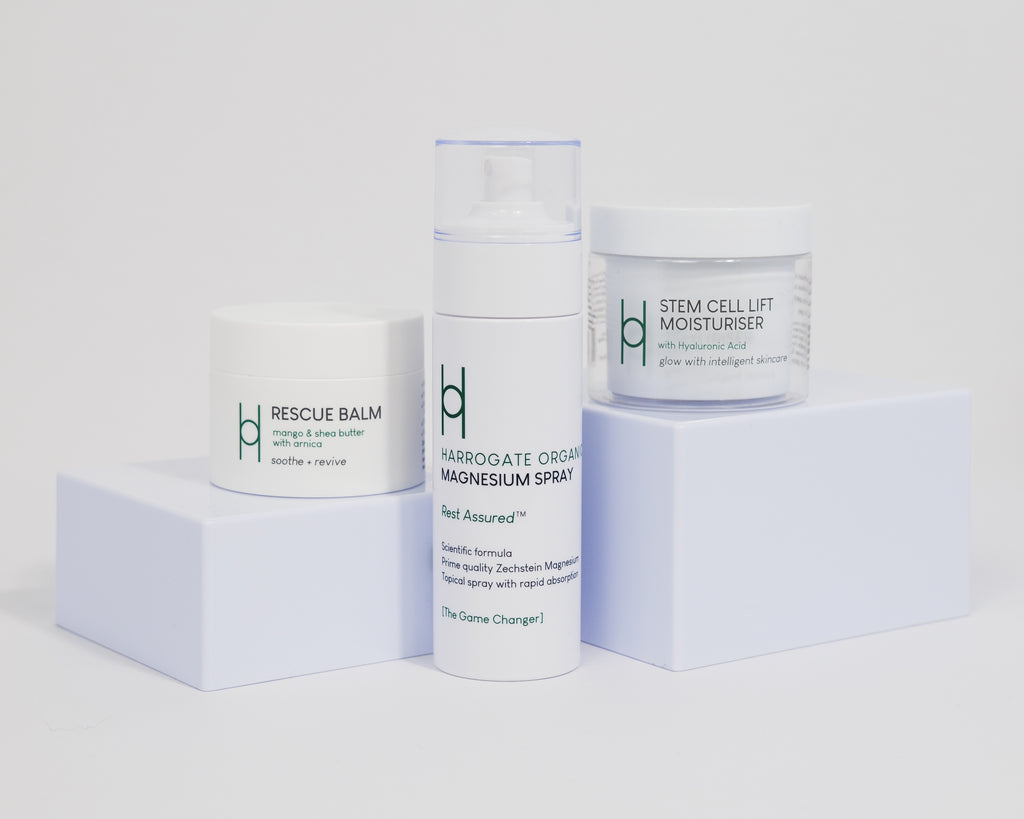 The Best Sellers Trio, featuring three skincare essentials, is beautifully displayed on minimalist white blocks set against a crisp white background.
