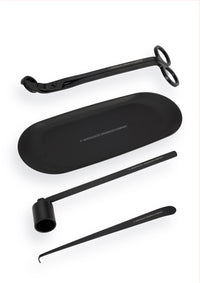 The Luxury Candle Care Kit includes a black metal wick cutter, snuffer, dipper, and oval tray with minimalist design, all labeled HarperCoffe Organics Company.