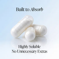 Three white capsules of Creatine HCL Supplement - 1500mg per serving, 90 capsules for a 30-day supply, rest on a glossy surface with a blue gradient. Text: Built to Absorb. Highly Soluble Creatine HCL. No Unnecessary Extras—your gym supplement simplified.