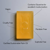 The Surprise & Delight Free Soap Bar is a rectangular yellow vegan bar featuring a masculine scent, certified sustainable palm oil, intense moisturisation with glycerine, and is cruelty free, paraben free, and sulphate free.