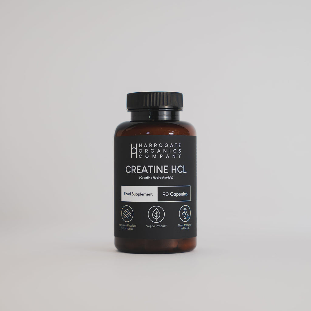 A brown bottle of Creatine HCL Supplement - 30 Day Supply - 90 Capsules - 750mg, labeled with icons for food supplement, vegan, and microbead-free. Designed for rapid absorption to support muscle growth, shown on a plain white background.