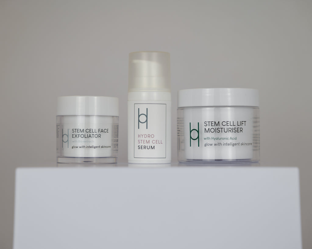 The Radiant Skin Set, featuring a Face Exfoliator, Serum, and Stem Cell Lift Moisturiser, is displayed on a white surface—each product designed to revitalize and nourish your skin for a glowing complexion.