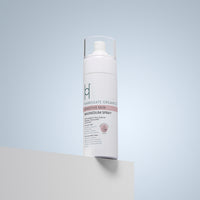 A 150ml bottle of Harrogate Organics Sensitive Skin Magnesium Spray with a clear cap, featuring a label that lists ingredients including Manuka, Chamomile, and Arnica.